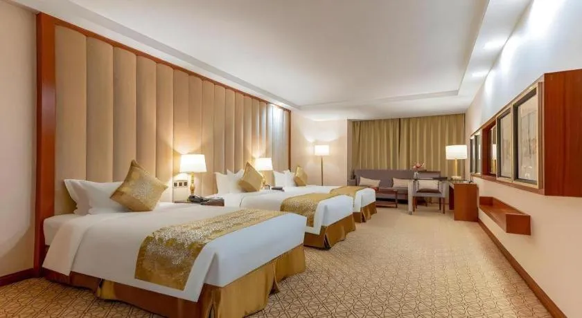 Bed in Yihe Grand Hotel