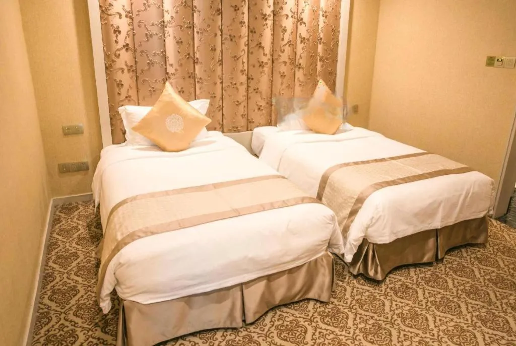 Bed in Yihe Grand Hotel