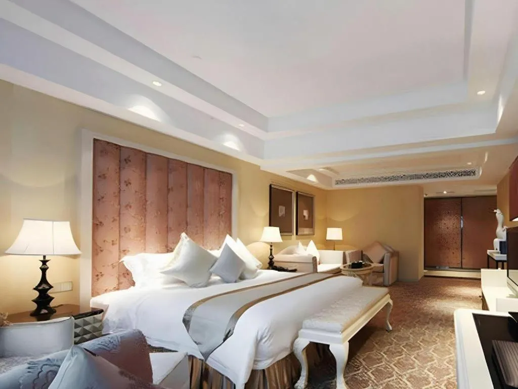 Bed in Yihe Grand Hotel