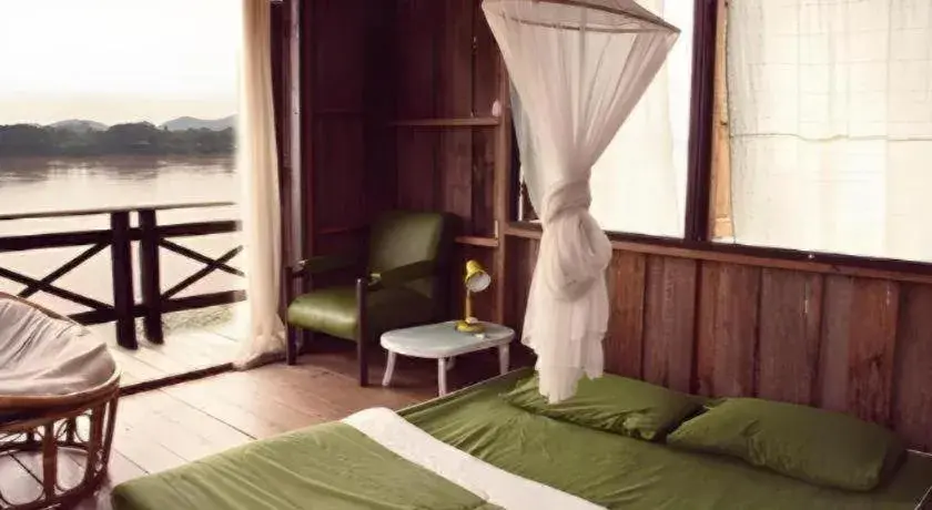 Bed in Baan ChanKhiang at ChiangKhan Bed in Baan ChanKhiang at ChiangKhan