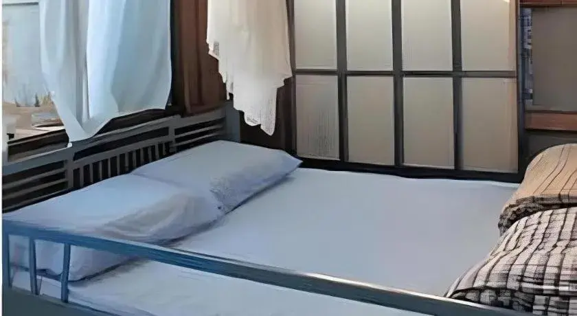 Bed in Baan ChanKhiang at ChiangKhan Bed in Baan ChanKhiang at ChiangKhan