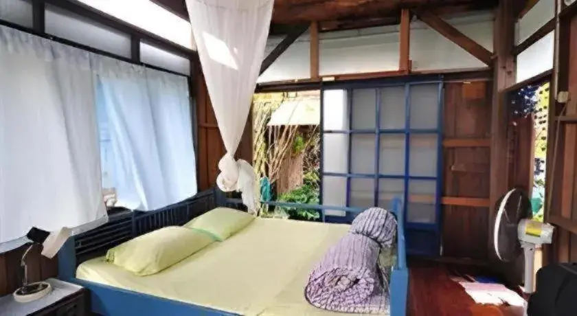 Bed in Baan ChanKhiang at ChiangKhan Bed in Baan ChanKhiang at ChiangKhan