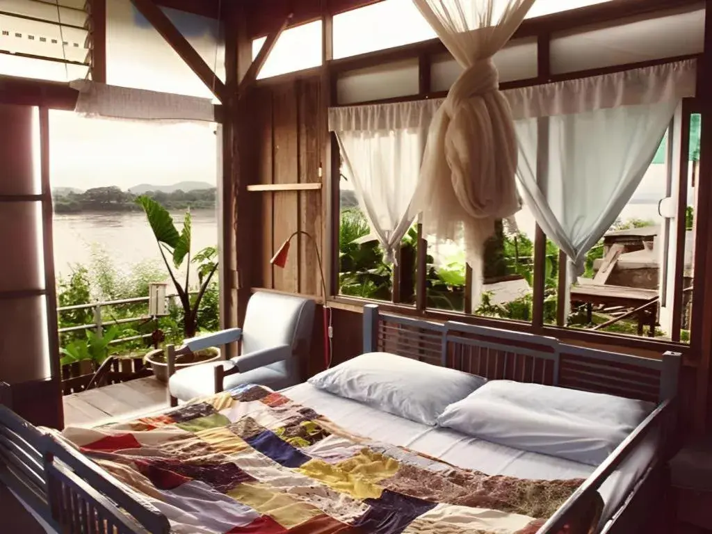 Bed in Baan ChanKhiang at ChiangKhan Bed in Baan ChanKhiang at ChiangKhan