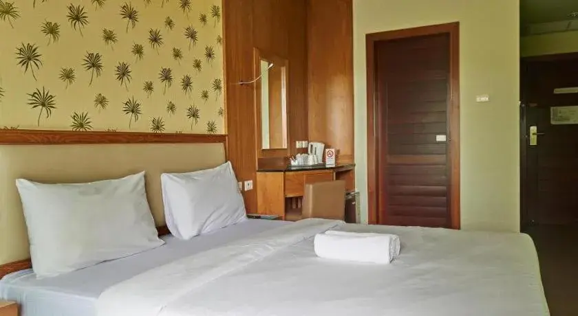 Bed in Phuket Ecozy Hotel Bed in Phuket Ecozy Hotel