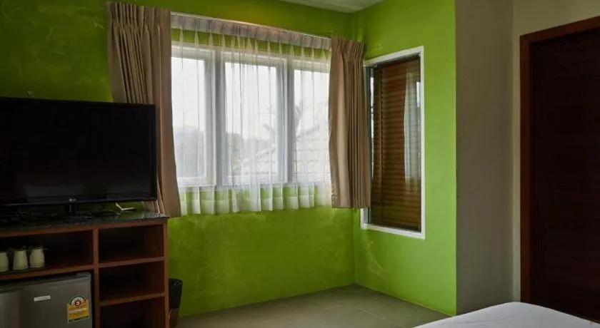 Bed in Phuket Ecozy Hotel