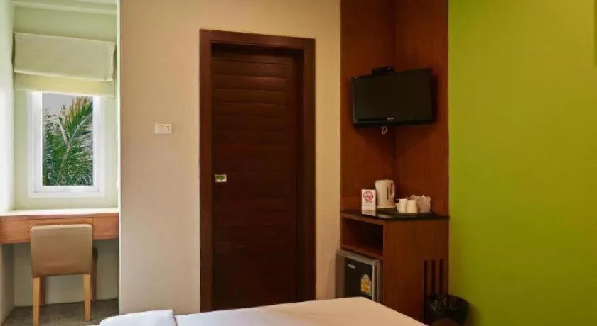 Bed in Phuket Ecozy Hotel