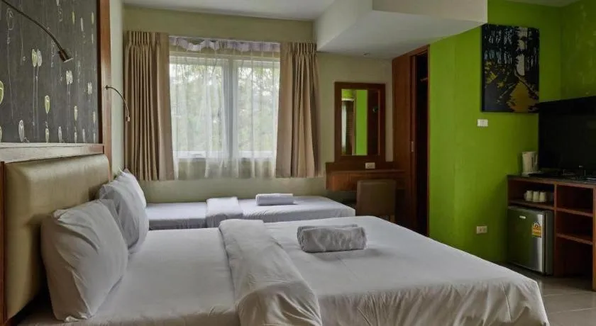 Bed in Phuket Ecozy Hotel