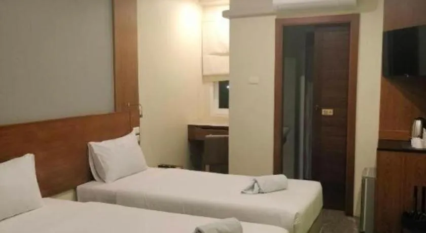 Bed in Phuket Ecozy Hotel