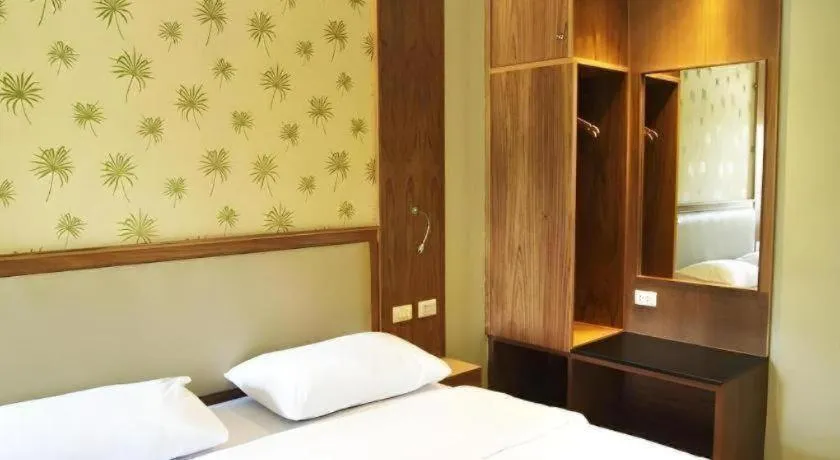 Bed in Phuket Ecozy Hotel