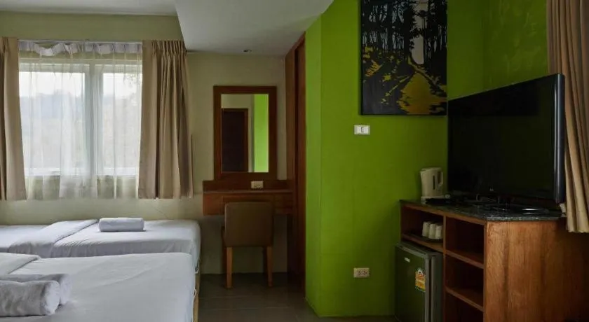 Bed in Phuket Ecozy Hotel