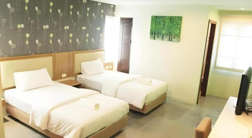 Bed in Phuket Ecozy Hotel