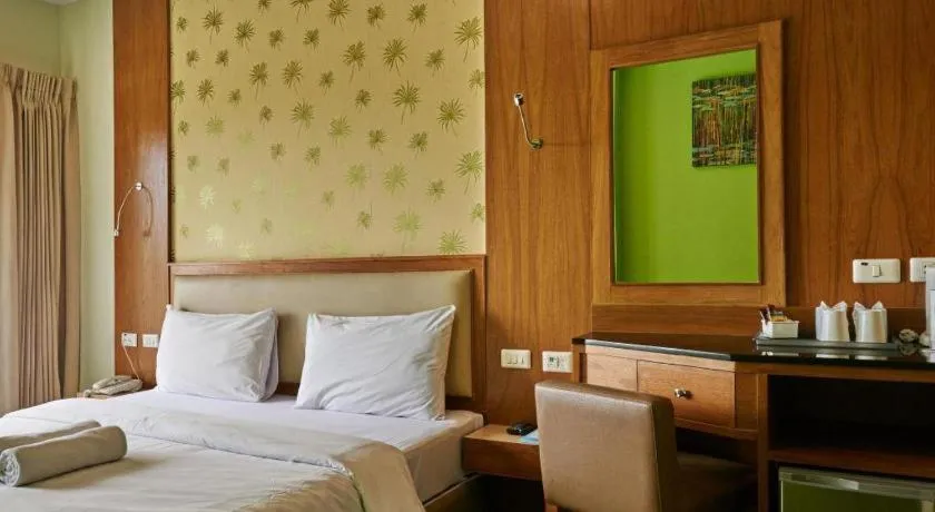 Bed in Phuket Ecozy Hotel