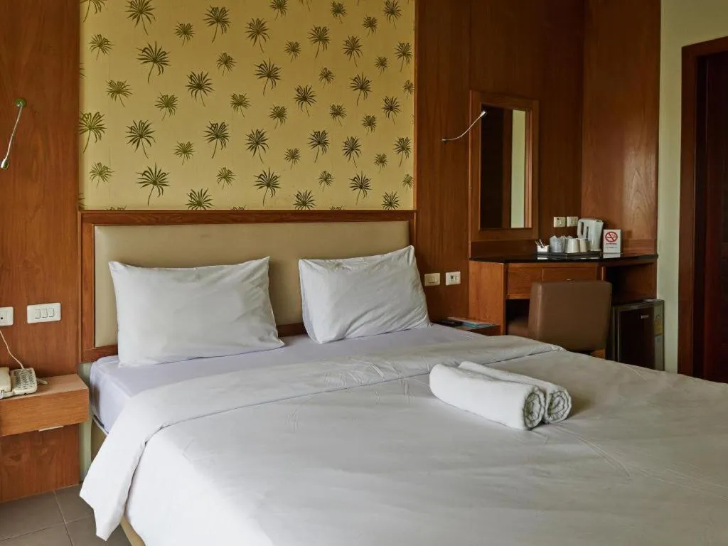 Bed in Phuket Ecozy Hotel