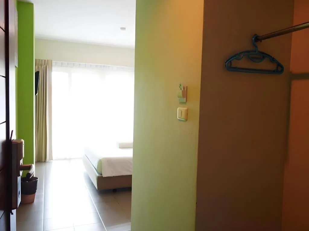 Bed in Phuket Ecozy Hotel