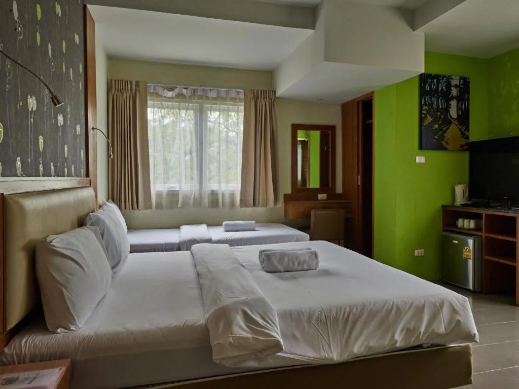 Bed in Phuket Ecozy Hotel