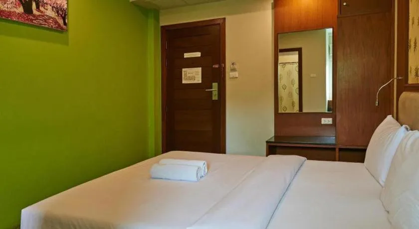 Bed in Phuket Ecozy Hotel