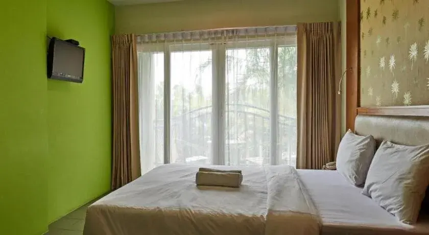 Bed in Phuket Ecozy Hotel Bed in Phuket Ecozy Hotel