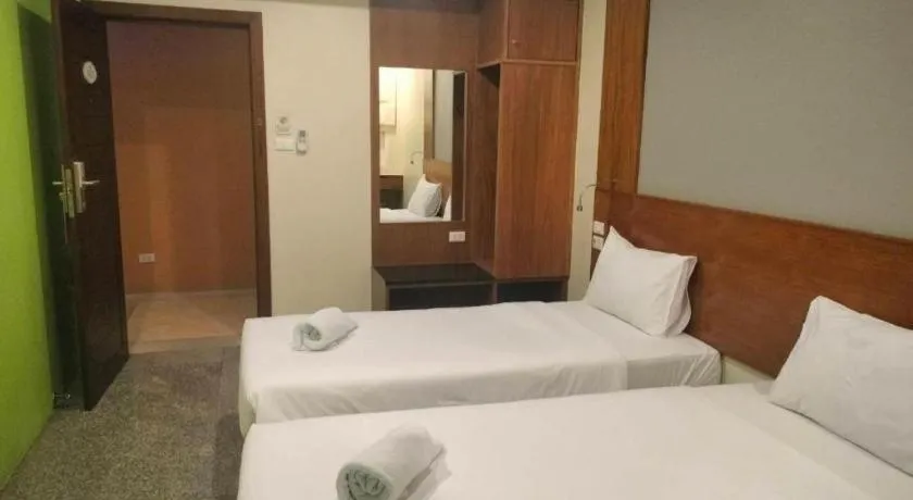 Bed in Phuket Ecozy Hotel