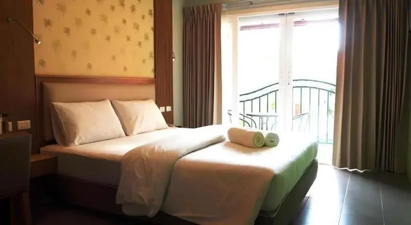 Bed in Phuket Ecozy Hotel Bed in Phuket Ecozy Hotel