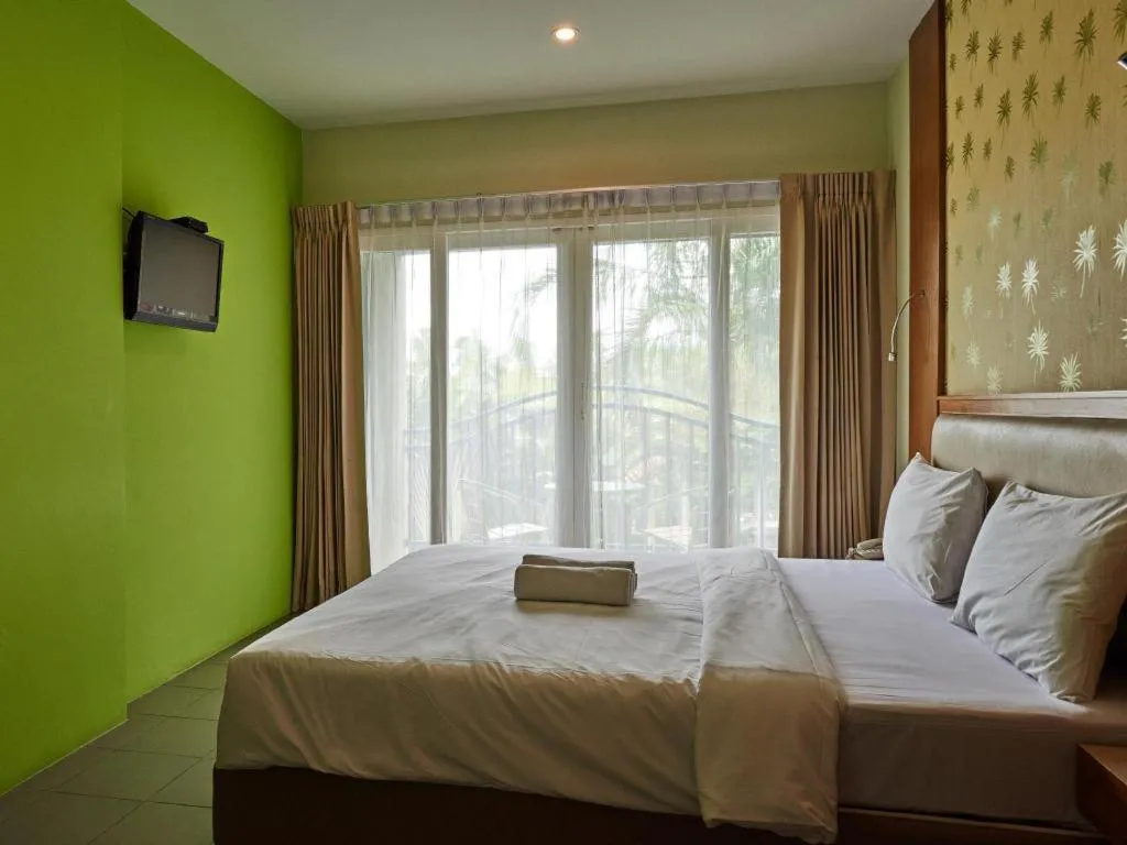 Bed in Phuket Ecozy Hotel