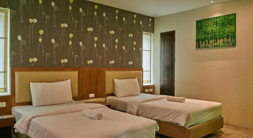 Bed in Phuket Ecozy Hotel