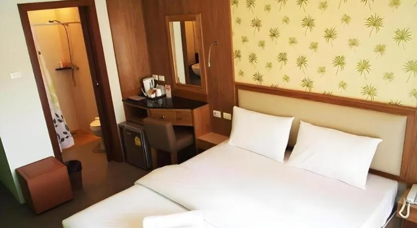 Bed in Phuket Ecozy Hotel