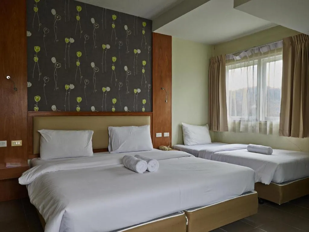 Bed in Phuket Ecozy Hotel