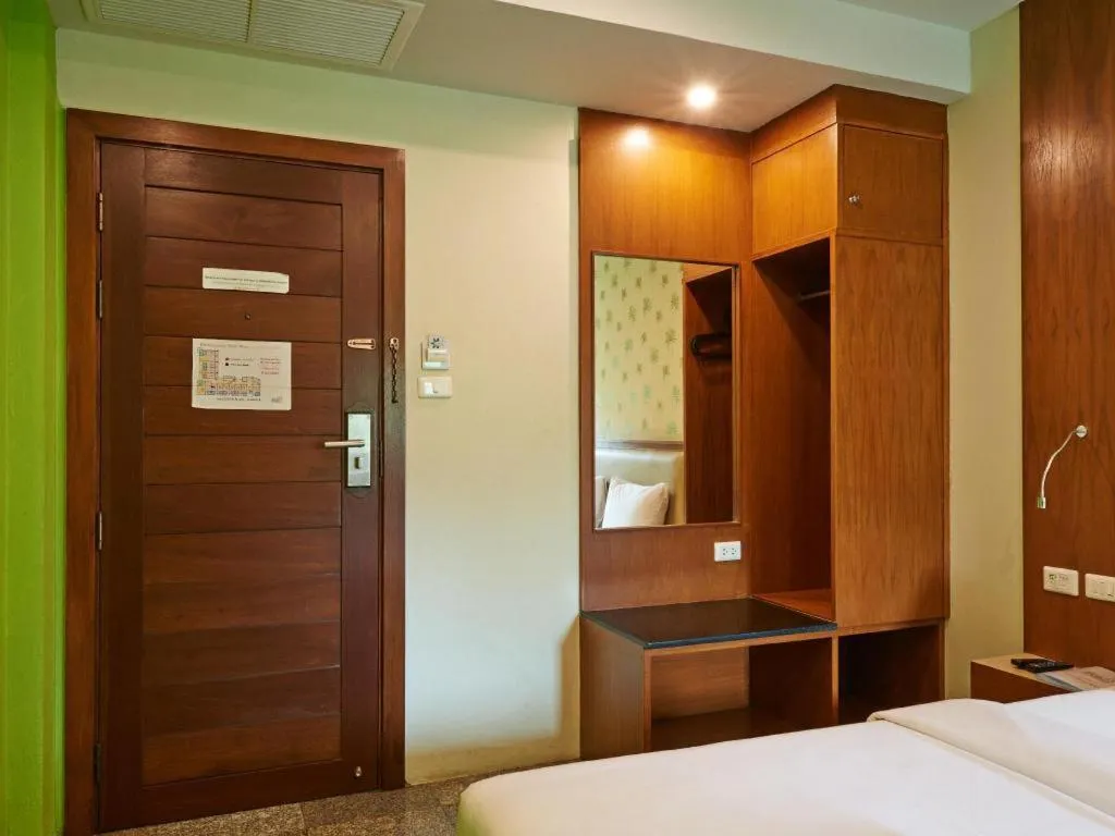 Bed in Phuket Ecozy Hotel