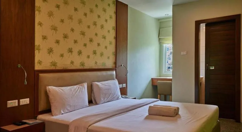 Bed in Phuket Ecozy Hotel