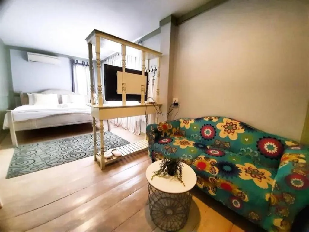 Bed in The Royal Chiangkhan Boutique Hotel