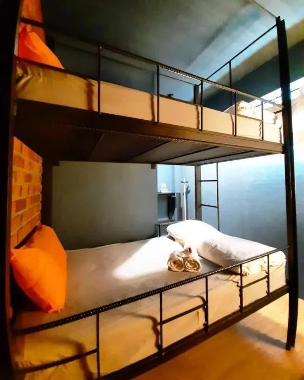 Bed in The Royal Chiangkhan Boutique Hotel