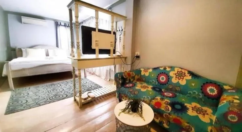 Bed in The Royal Chiangkhan Boutique Hotel