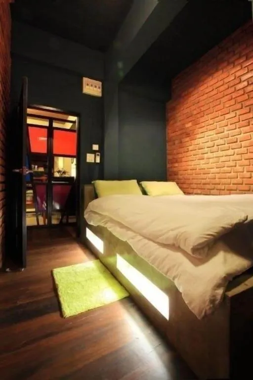 Bed in The Royal Chiangkhan Boutique Hotel