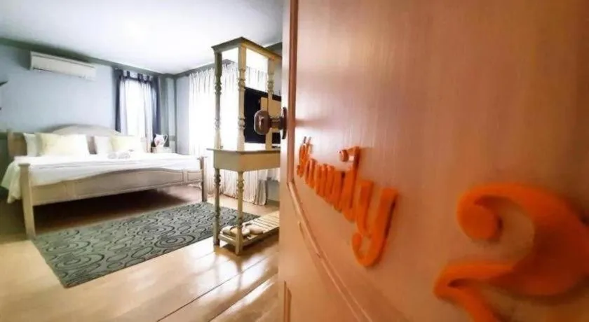 Bed in The Royal Chiangkhan Boutique Hotel