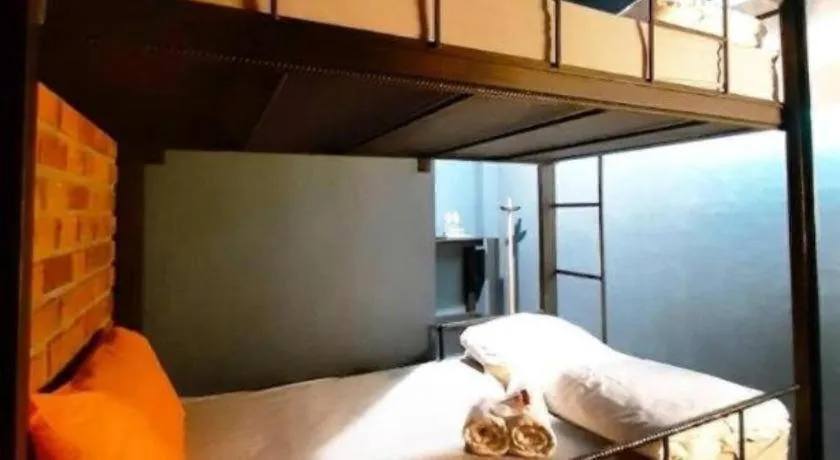 Bed in The Royal Chiangkhan Boutique Hotel