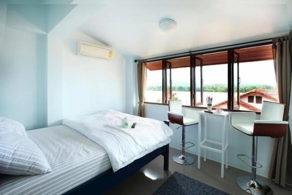 Bed in The Royal Chiangkhan Boutique Hotel