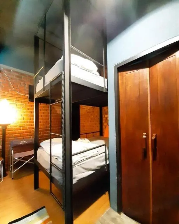 Bed in The Royal Chiangkhan Boutique Hotel