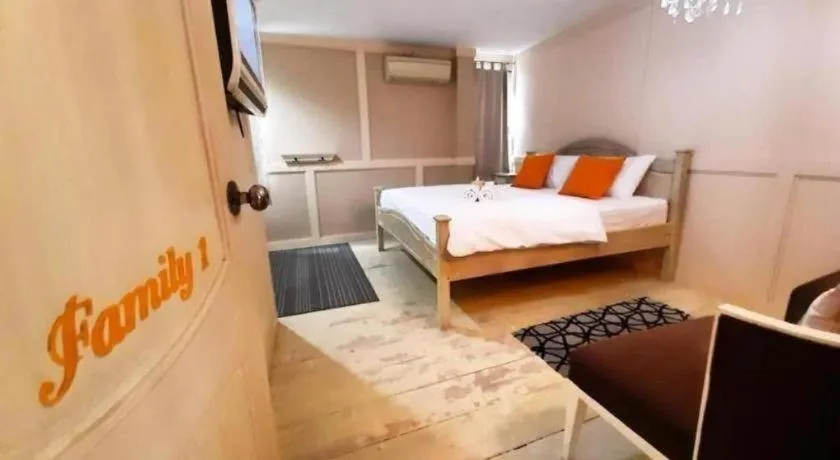 Bed in The Royal Chiangkhan Boutique Hotel