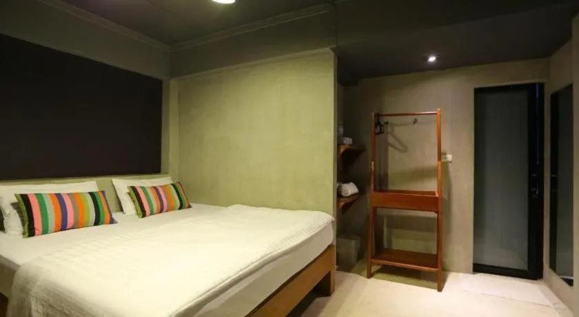 Bed in Chic Chiangkhan Hotel