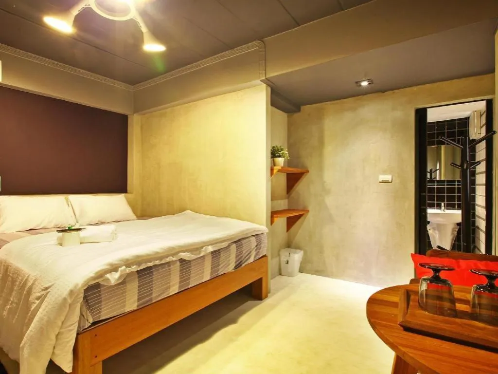 Bed in Chic Chiangkhan Hotel