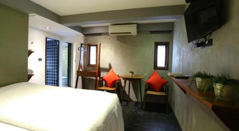 Bed in Chic Chiangkhan Hotel