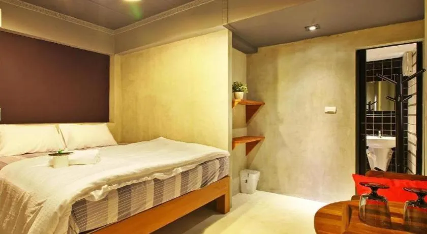 Bed in Chic Chiangkhan Hotel