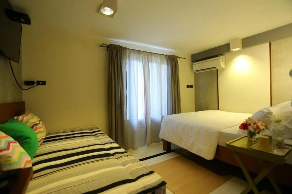 Bed in Chic Chiangkhan Hotel