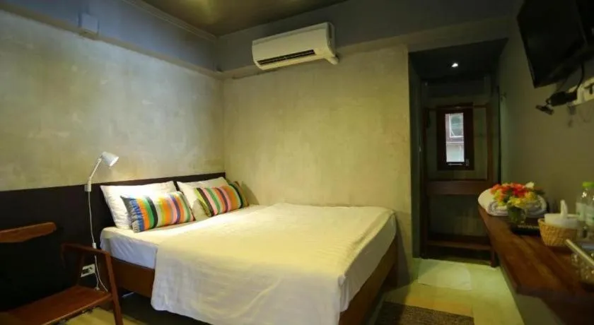 Bed in Chic Chiangkhan Hotel