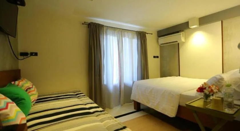 Bed in Chic Chiangkhan Hotel