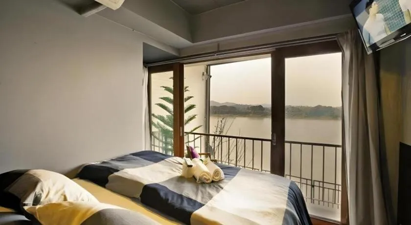 Bed in Chic Chiangkhan Hotel