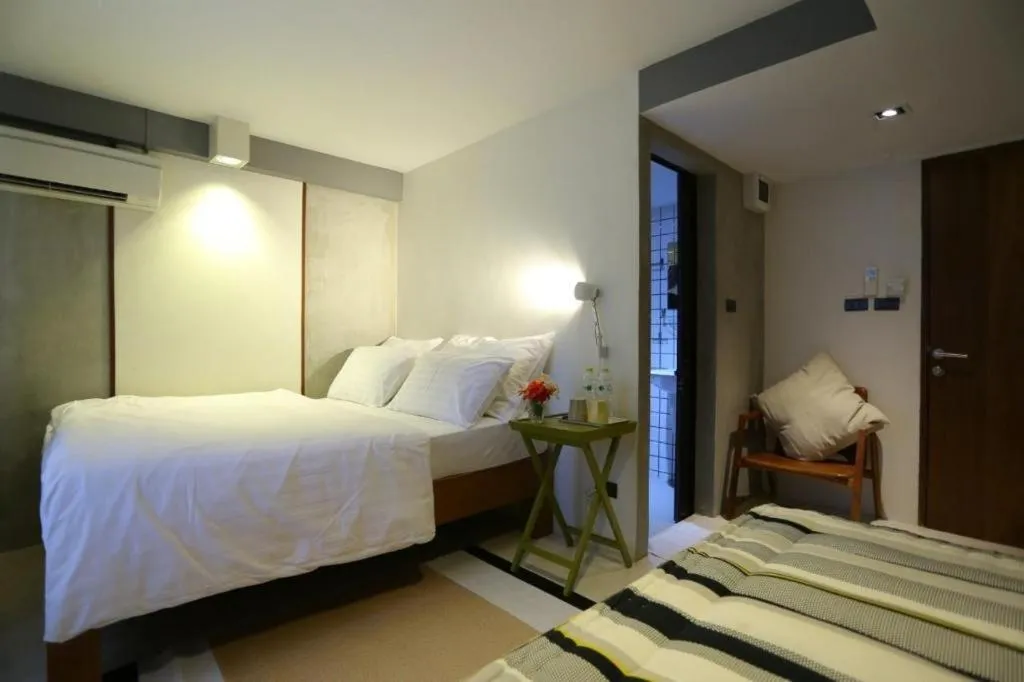 Bed in Chic Chiangkhan Hotel