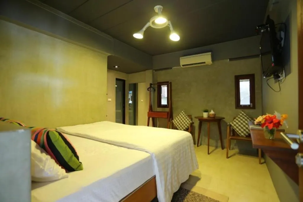 Bed in Chic Chiangkhan Hotel