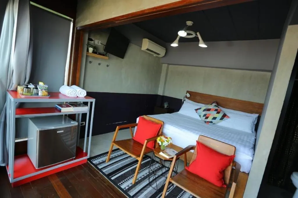 Bed in Chic Chiangkhan Hotel