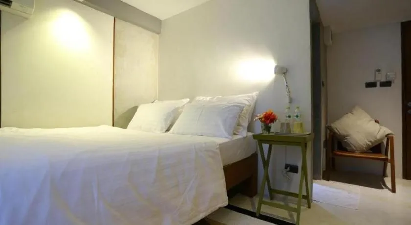 Bed in Chic Chiangkhan Hotel